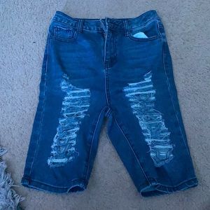 Dark wash capri shorts with rips